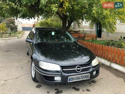 Черный Опель Омега, объемом двигателя 2.5 л и пробегом 155 тыс. км за 3000 $, фото 1 на Automoto.ua