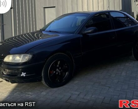 Черный Опель Омега, объемом двигателя 2 л и пробегом 360 тыс. км за 1999 $, фото 1 на Automoto.ua