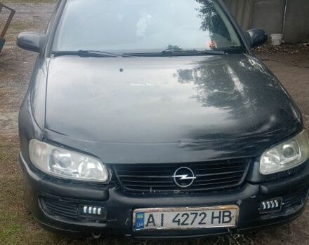 Чорний Опель Омега, об'ємом двигуна 2 л та пробігом 324 тис. км за 1500 $, фото 1 на Automoto.ua