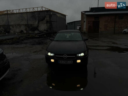 Черный Опель Омега, объемом двигателя 2 л и пробегом 380 тыс. км за 3800 $, фото 1 на Automoto.ua