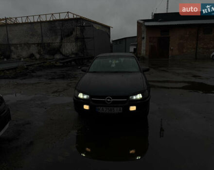 Черный Опель Омега, объемом двигателя 2 л и пробегом 380 тыс. км за 3800 $, фото 1 на Automoto.ua