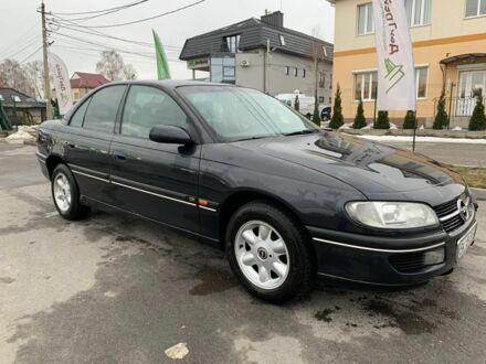 Опель Омега 1996 в Ровно на Automoto.ua Черный Опель Омега, объемом двигателя 2 л и пробегом 300 тыс. км за 2300 $, фото 1 на Automoto.ua