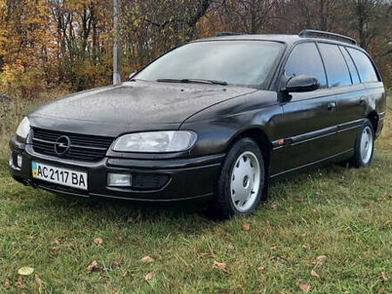 Черный Опель Омега, объемом двигателя 2.5 л и пробегом 445 тыс. км за 1750 $, фото 1 на Automoto.ua