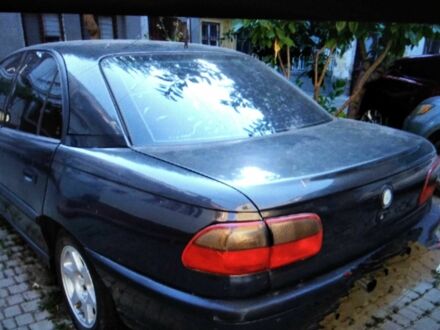 Чорний Опель Омега, об'ємом двигуна 2 л та пробігом 230 тис. км за 1000 $, фото 1 на Automoto.ua