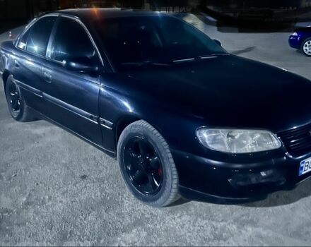 Черный Опель Омега, объемом двигателя 2 л и пробегом 268 тыс. км за 1499 $, фото 1 на Automoto.ua