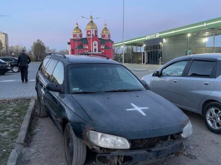 Черный Опель Омега, объемом двигателя 2 л и пробегом 300 тыс. км за 400 $, фото 1 на Automoto.ua