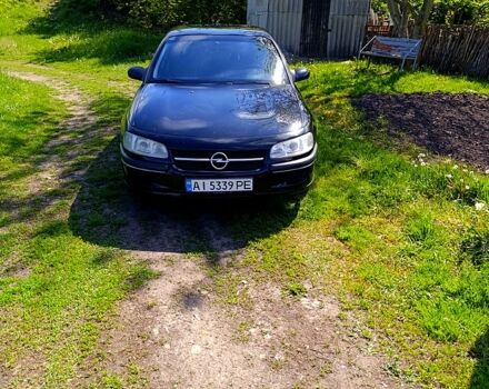 Черный Опель Омега, объемом двигателя 2.5 л и пробегом 410 тыс. км за 1950 $, фото 1 на Automoto.ua