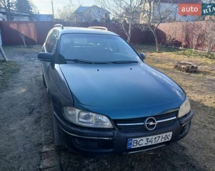Черный Опель Омега, объемом двигателя 2 л и пробегом 480 тыс. км за 600 $, фото 1 на Automoto.ua