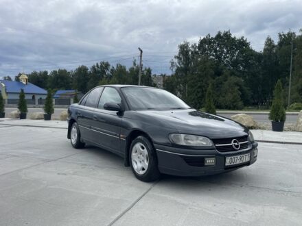 Чорний Опель Омега, об'ємом двигуна 2 л та пробігом 426 тис. км за 1500 $, фото 1 на Automoto.ua