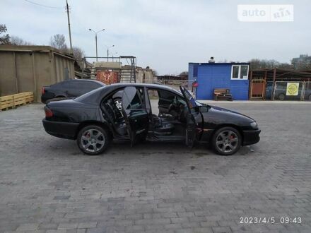 Опель Омега 1998 в Запорожье на Automoto.ua Черный Опель Омега, объемом двигателя 2.5 л и пробегом 350 тыс. км за 4300 $, фото 1 на Automoto.ua