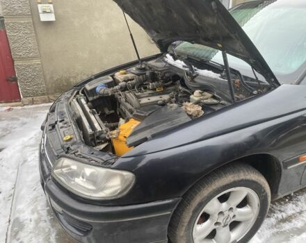 Черный Опель Омега, объемом двигателя 2 л и пробегом 298 тыс. км за 2500 $, фото 1 на Automoto.ua