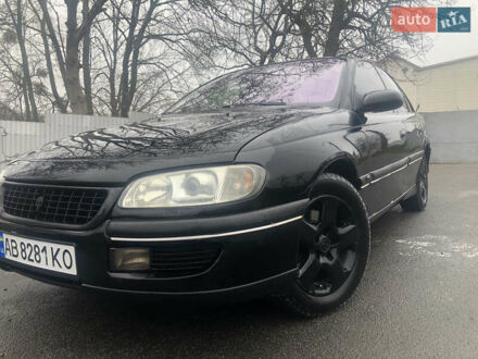 Черный Опель Омега, объемом двигателя 2 л и пробегом 298 тыс. км за 2399 $, фото 1 на Automoto.ua