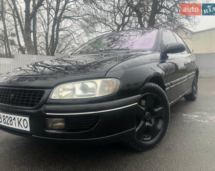 Черный Опель Омега, объемом двигателя 2 л и пробегом 298 тыс. км за 2399 $, фото 1 на Automoto.ua