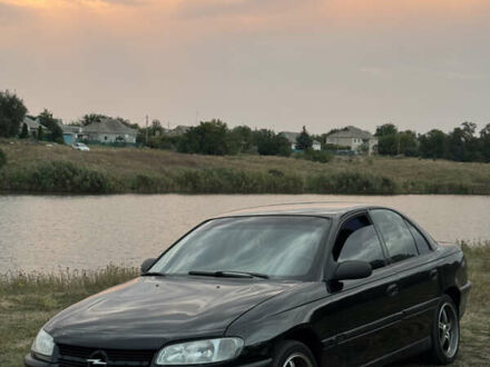 Чорний Опель Омега, об'ємом двигуна 2 л та пробігом 400 тис. км за 3000 $, фото 1 на Automoto.ua