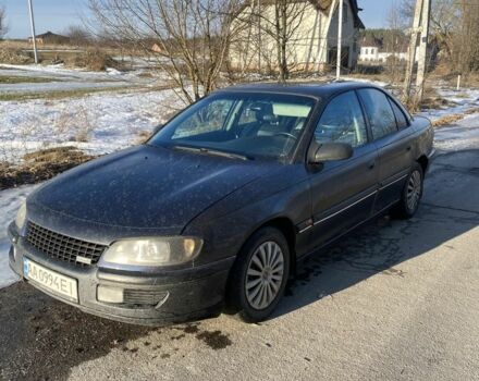 Черный Опель Омега, объемом двигателя 2.5 л и пробегом 437 тыс. км за 1800 $, фото 1 на Automoto.ua