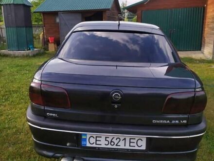 Опель Омега 1998 у Чернівцях на Automoto.ua Чорний Опель Омега, об'ємом двигуна 2.5 л та пробігом 250 тис. км за 4200 $, фото 1 на Automoto.ua