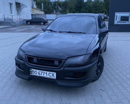 Чорний Опель Омега, об'ємом двигуна 2 л та пробігом 440 тис. км за 3300 $, фото 1 на Automoto.ua