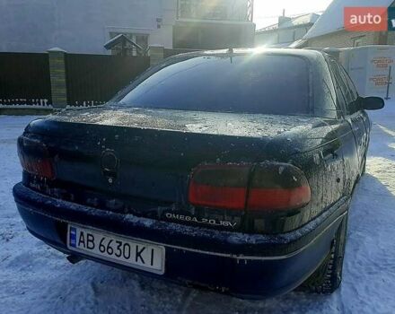 Черный Опель Омега, объемом двигателя 2 л и пробегом 500 тыс. км за 1300 $, фото 1 на Automoto.ua
