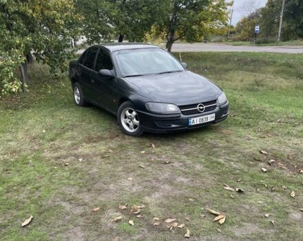 Черный Опель Омега, объемом двигателя 2 л и пробегом 400 тыс. км за 2300 $, фото 1 на Automoto.ua