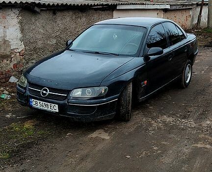 Черный Опель Омега, объемом двигателя 2 л и пробегом 320 тыс. км за 1700 $, фото 1 на Automoto.ua