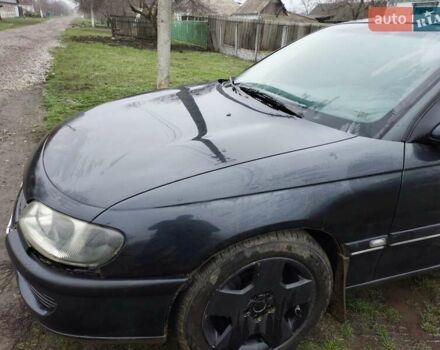 Черный Опель Омега, объемом двигателя 2.5 л и пробегом 340 тыс. км за 2596 $, фото 1 на Automoto.ua