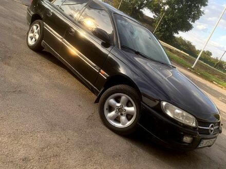 Черный Опель Омега, объемом двигателя 2 л и пробегом 313 тыс. км за 2550 $, фото 1 на Automoto.ua