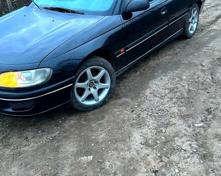 Черный Опель Омега, объемом двигателя 2 л и пробегом 388 тыс. км за 2900 $, фото 1 на Automoto.ua