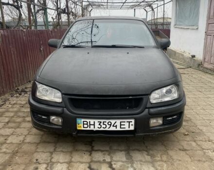 Черный Опель Омега, объемом двигателя 2 л и пробегом 300 тыс. км за 2100 $, фото 1 на Automoto.ua