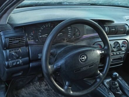 Чорний Опель Омега, об'ємом двигуна 2 л та пробігом 1 тис. км за 1000 $, фото 1 на Automoto.ua