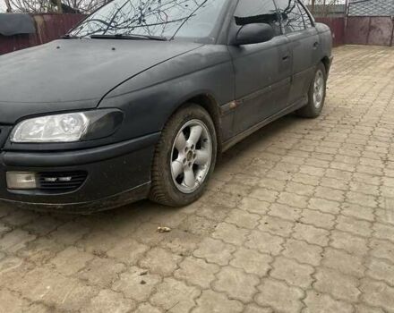 Черный Опель Омега, объемом двигателя 2 л и пробегом 300 тыс. км за 2100 $, фото 1 на Automoto.ua