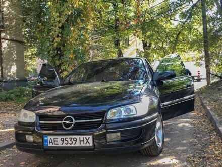 Чорний Опель Омега, об'ємом двигуна 2.5 л та пробігом 250 тис. км за 2409 $, фото 1 на Automoto.ua
