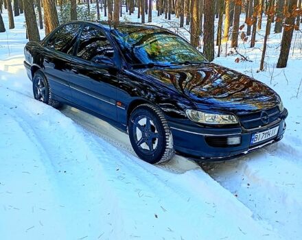 Черный Опель Омега, объемом двигателя 2 л и пробегом 500 тыс. км за 2800 $, фото 1 на Automoto.ua