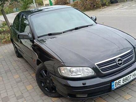 Черный Опель Омега, объемом двигателя 3 л и пробегом 260 тыс. км за 3500 $, фото 1 на Automoto.ua