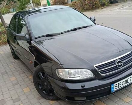 Черный Опель Омега, объемом двигателя 3 л и пробегом 260 тыс. км за 3000 $, фото 1 на Automoto.ua