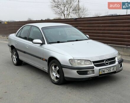 Черный Опель Омега, объемом двигателя 2.5 л и пробегом 407 тыс. км за 1650 $, фото 1 на Automoto.ua