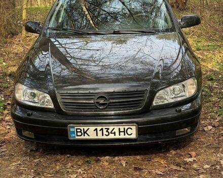 Черный Опель Омега, объемом двигателя 2.5 л и пробегом 275 тыс. км за 2600 $, фото 1 на Automoto.ua