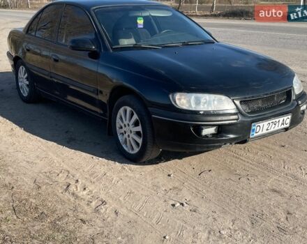 Черный Опель Омега, объемом двигателя 2 л и пробегом 380 тыс. км за 2100 $, фото 1 на Automoto.ua