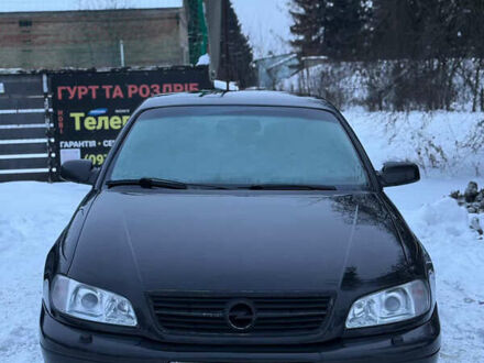 Черный Опель Омега, объемом двигателя 2.5 л и пробегом 273 тыс. км за 2999 $, фото 1 на Automoto.ua