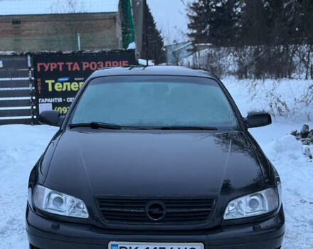 Черный Опель Омега, объемом двигателя 2.5 л и пробегом 273 тыс. км за 2999 $, фото 1 на Automoto.ua