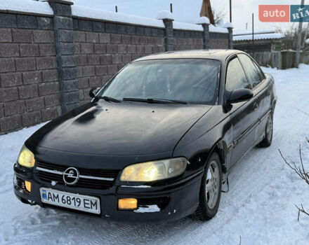 Чорний Опель Омега, об'ємом двигуна 2 л та пробігом 335 тис. км за 1250 $, фото 1 на Automoto.ua