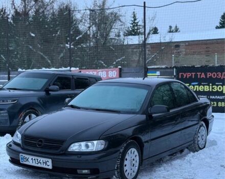 Черный Опель Омега, объемом двигателя 2.5 л и пробегом 270 тыс. км за 3199 $, фото 1 на Automoto.ua
