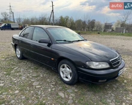 Черный Опель Омега, объемом двигателя 2 л и пробегом 340 тыс. км за 1700 $, фото 1 на Automoto.ua