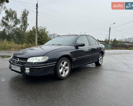 Черный Опель Омега, объемом двигателя 2.5 л и пробегом 400 тыс. км за 1499 $, фото 1 на Automoto.ua