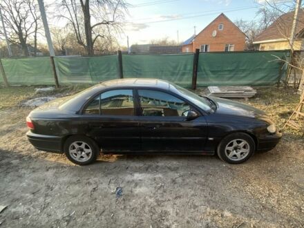 Чорний Опель Омега, об'ємом двигуна 2.5 л та пробігом 242 тис. км за 2650 $, фото 1 на Automoto.ua