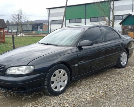 Черный Опель Омега, объемом двигателя 2.5 л и пробегом 380 тыс. км за 1700 $, фото 1 на Automoto.ua