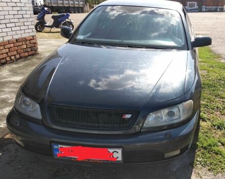 Черный Опель Омега, объемом двигателя 2.5 л и пробегом 300 тыс. км за 3500 $, фото 1 на Automoto.ua