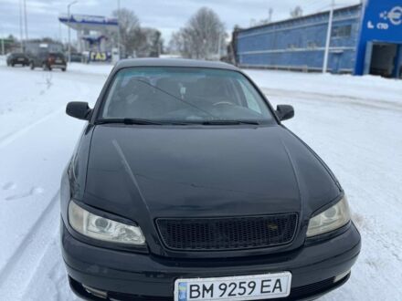 Чорний Опель Омега, об'ємом двигуна 2.6 л та пробігом 250 тис. км за 2200 $, фото 1 на Automoto.ua