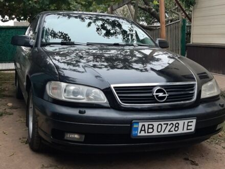 Черный Опель Омега, объемом двигателя 2.2 л и пробегом 270 тыс. км за 2600 $, фото 1 на Automoto.ua