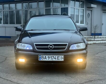 Черный Опель Омега, объемом двигателя 2.2 л и пробегом 375 тыс. км за 2599 $, фото 1 на Automoto.ua