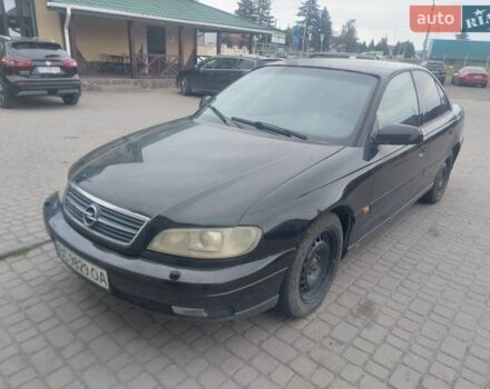 Черный Опель Омега, объемом двигателя 2.2 л и пробегом 200 тыс. км за 1200 $, фото 1 на Automoto.ua